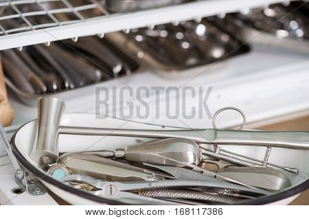 Stomatological instrument in the dentists clinic. Dental background: work in clinic. Operation tooth replacement.