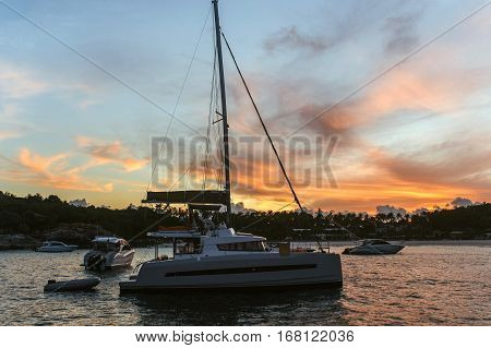 Catamaran at dawn. Romance of the seas