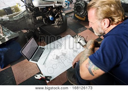 Construction Master Plan Draft Blueprint Male Laptop Concept