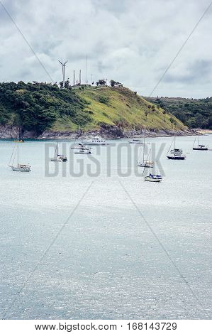 Sailboats in the bay. Yachts at the pier in bad weather. Rain season
