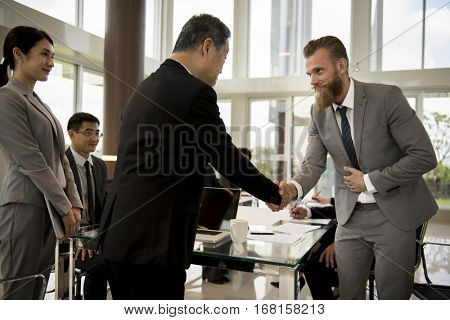 Business Partners Introductionary Handshake Bow