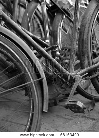 ABSTRACT SHOT OF OLD RUSTY BICYCLE PARTS