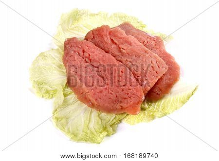 Raw Sliced Meat On A Cabbage Leaf