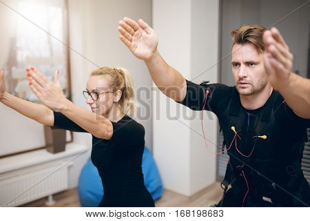 Sportsman Concentrated On Training With Coach