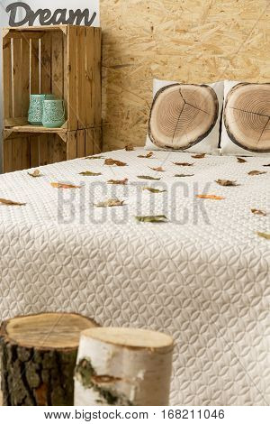 Bedroom With Bed And Natural Accents