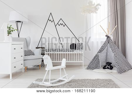 Room With Cockhorse And Crib