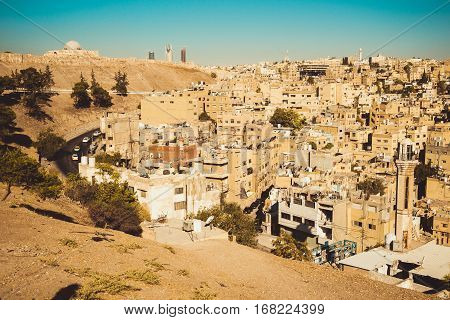 Photo of the Amman city view with Umayyad Palace on background. Urban landscape. Residential area. Arabic architecture. Eastern city. Housing estate