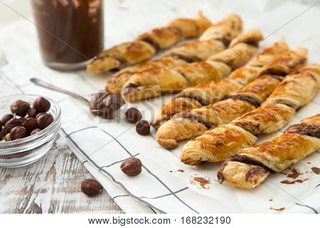 Homemade Cakes - Puff Pastry With Chocolate Paste. Twisted Cakes With Chocolate
