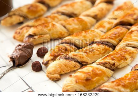 Homemade Cakes - Puff Pastry With Chocolate Paste. Twisted Cakes With Chocolate