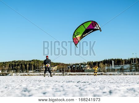Kavgolovo.Russia.22 Jan 2017.Athletes engaged in Snowkiting on the ice lake Khepoyarvi in Kavgolovo Leningrad oblast