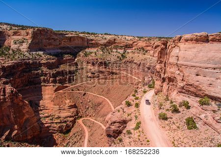 Winding Shafer Trail road in Canyonlands national park, Moab Utah USA