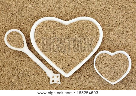 Teff super grain health food in heart shaped porcelain dishes and spoon forming a background.
