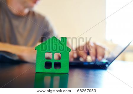 wooden house on the office table