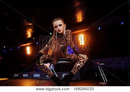 Cheerful sexy girls living it up on the dance floor