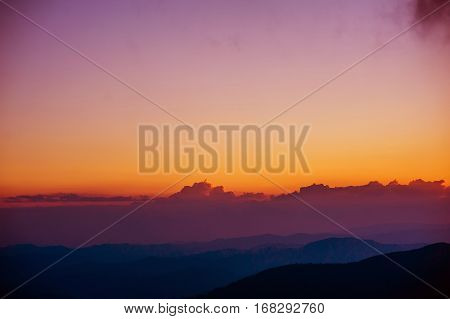 The picturesque landscape and dramatic sky during sunset in mountain Carpathians