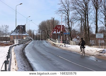 POLESSK, KALININGRAD REGION, RUSSIA - JANUARY 30, 2011: Old german movable bridge known as Eagle (Adler Brucke) through Deima river in the city of Polessk (Labiau). The bridge was built in 1919-1922.