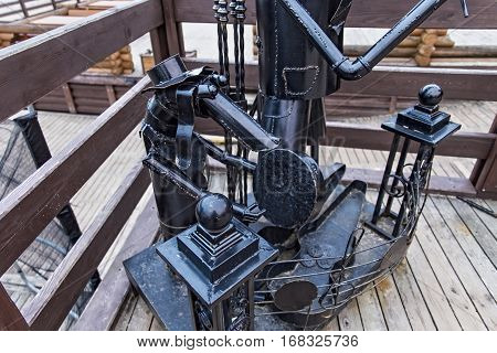 ZELENOGRADSK, KALININGRAD REGION, RUSSIA - January 26, 2017: Sculpture of iron stray dogs musicians which play a musical instrument in the popular russian sea resort Zelenogradsk (Cranz).