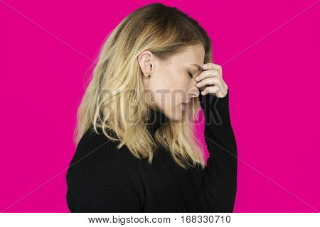 Frustrated woman touching her temple