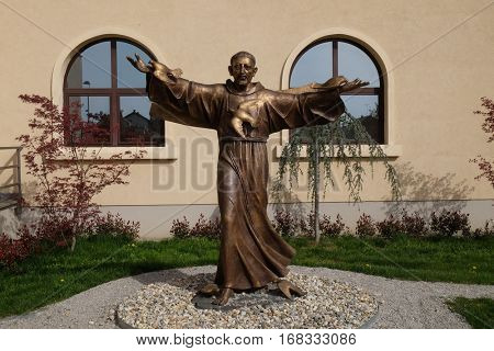 ZAGREB, CROATIA - APRIL 04: Saint Francis of Assisi statue in front of St. Leopold Mandic church in Zagreb, Croatia on April 04, 2016.