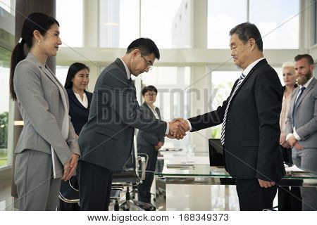 Business Partners Introductionary Handshake Bow