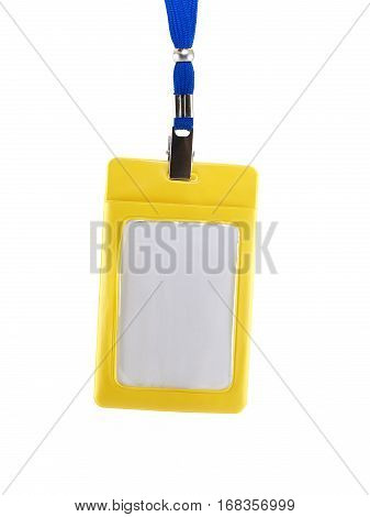 ID badge for hanging on neck isolated on white background, close up blank personal name tag in yellow plastic case for your simple text, vertical image