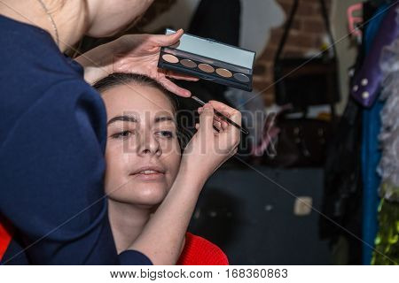 Make-up Artist Doing The Make-up For Nice Girl