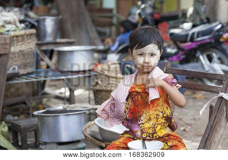 Bagan Myanmar November 9th 2014: little girl with thanaka covered face