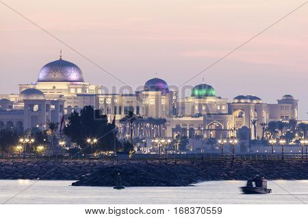 New Presidential Palace illuminated at night. Abu Dhabi United Arab Emirates