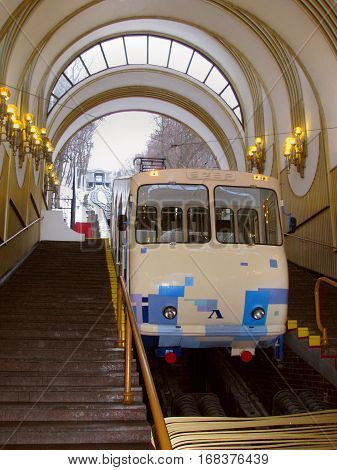 Blue-white cable car awaits passengers before sending Kiev Ukraine