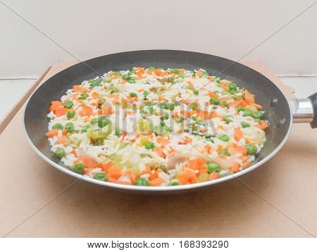 Zeleninove rizoto (meaning Czech style vegetable risotto) in a pan
