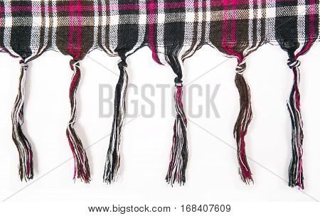Fringe from threads. Striped bright structure of a knitted fabric background