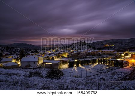 Nocturnal landscape of Cuatretondeta / Quatretondeta, Alicante, Spain after a historic snowfall.