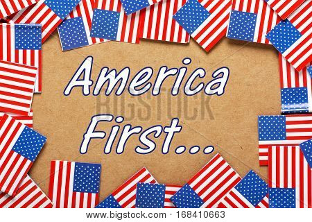 The words America First surrounded by a border of United States flags