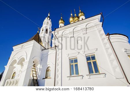 Modern white Orthodox Church against the bright blue sky