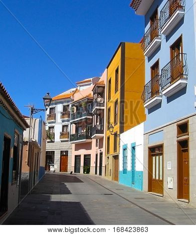 Beautiful colorful buildings in a narrow street in the old town of Puerto de la Cruz one of the most popular tourist cities in Tenerife