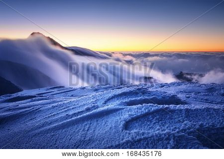 Amazing Foggy Sunset At Mountain Peak During Cold Winter Day In Mala Fatra, Slovakia