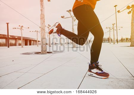 Blurred background with fitness sports running legs in the morning time.Copyspace for inspiration and motivation text and notes
