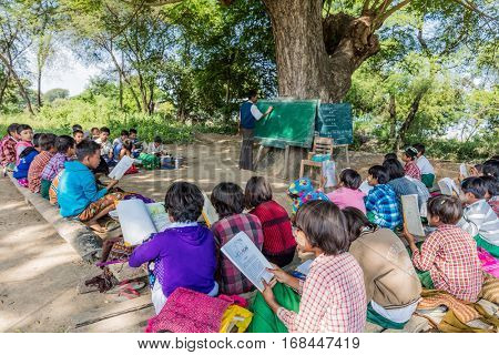 Chaung-U, Myanmar - December 01, 2016 : children at an outside clasroom school in Myanmar
