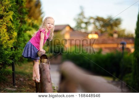Cute Little Girl Having Fun In Lonato Del Garda, A Small Town And Comune In The Province Of Brescia,