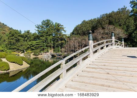 Wooden bridge in Ritsurin Garden 