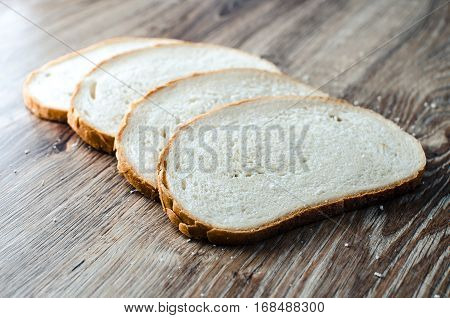 Fresh bread on wood background Apartment will post pictures of bread on a wooden Board.