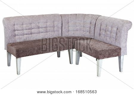 Corner banquette bench with backrest upholstered in a soft cloth isolated on white background with clipping path.