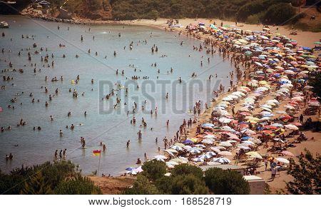 DIDIM TURKEY - JULY 9 2014. Beach with tourists a top view.