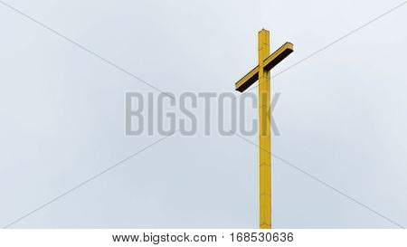Gold cross on a church isolated with white background space for qoute / text