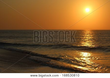Sunset in the beCabo Ledo / Angola - May 2015: ach of Cabo Ledo in Angola
