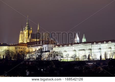 Panorama of an old Prague, bridges and embankment of Vitava river, Czechia in a night