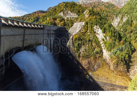 Kurobe Dam and rainbow in Autumn season