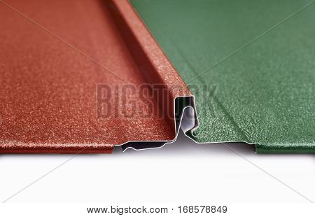 Metal roof panels connection with snap lock. Macro.macro