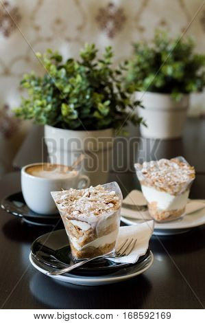 Cup cream with yoghurt and oat in a coffee shop
