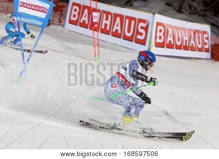 STOCKHOLM SWEDEN - JAN 31 2017: Side view of Veronika Velez Zuzulova (SVK) and competiotor in the downhill skiing in the parallel slalom alpine event Audi FIS Ski World Cup. January 31 2017 Stockholm Sweden